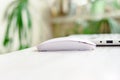 Computer notebook, mouse on white apartment background. Home mobile online business office concept Royalty Free Stock Photo