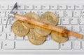 Computer and pickaxe on bitcoins Royalty Free Stock Photo