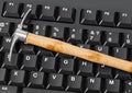 Computer and pickaxe - bitcoins mining Royalty Free Stock Photo