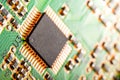 Computer processor chip on a circuit board with microchips and other electronic parts CPU Chip on Motherboard Royalty Free Stock Photo