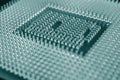 Computer processor close-up. Dark blue green tinted background or backdrop. Wallpaper on the theme of information technology. A Royalty Free Stock Photo
