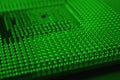 Computer processor close up. Dark green tinted background or backdrop. Information technology wallpaper. A pattern of contacts and Royalty Free Stock Photo