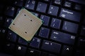 Computer processor on keyboard. Close up. Toned image Royalty Free Stock Photo