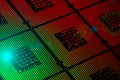 Computer processors aligned with red and green lighting effects postproduction Royalty Free Stock Photo