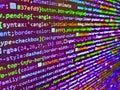 Computer program. Programming text on dark screen. Andorra flag  is depicted on the screen with the program code. Programing Royalty Free Stock Photo