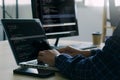 Computer programmer working on new software program.Coder recruited for solve all the script failures and renown the cyber safety Royalty Free Stock Photo