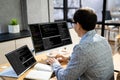 Computer Programmer Writing Program Code On Computer