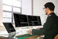 Computer Programmer Writing Program Code On Computer
