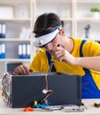 Computer repair technician repairing hardware Royalty Free Stock Photo