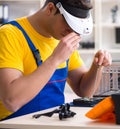 Computer repair technician repairing hardware Royalty Free Stock Photo