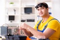 The computer repair technician repairing hardware Royalty Free Stock Photo