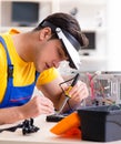 Computer repair technician repairing hardware Royalty Free Stock Photo