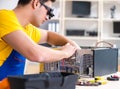 Computer repair technician repairing hardware Royalty Free Stock Photo