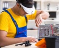 Computer repair technician repairing hardware Royalty Free Stock Photo