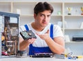 Computer repairman repairing desktop computer Royalty Free Stock Photo