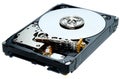 A computer`s hard disk hdd data storage drive without shield show magnetic disc and electronic part inside isolated  in white Royalty Free Stock Photo