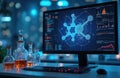 Computer screen displays molecular structure data with charts. Lab flasks with orange liquid sit on desk. Modern science research Royalty Free Stock Photo