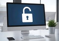 Computer screen displays open padlock icon on blue background Royalty Free Stock Photo