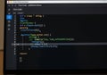 A computer screen displays a text editor, likely Visual Studio Code, with a programming interface. Royalty Free Stock Photo