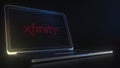 Computer screen with the logo of XFINITY made with source code. Editorial conceptual 3d rendering