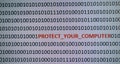 Computer screen shot with binary code and warning text, concept for computer, technology and online security. Royalty Free Stock Photo