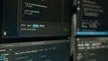 Computer screen of software developer typing programming language Royalty Free Stock Photo