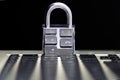 Computer Security Concept with a Closed Padlock on the Keyboard on Black Background Royalty Free Stock Photo