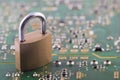 Computer security concept. Padlock on computer circuit board Royalty Free Stock Photo