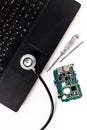 Computer servise and repair concept - kayboard with stethoscope Royalty Free Stock Photo