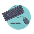 Computer setup featuring a black keyboard and mouse connecte Royalty Free Stock Photo
