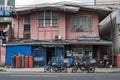 Computer shop opened in an old wooden house in Manila.