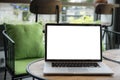 Computer on the table inside coffee shop Royalty Free Stock Photo