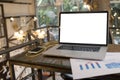 Computer on the table inside coffee shop Royalty Free Stock Photo