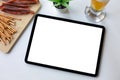 computer tablet isolated screen background white table in cafe bar Royalty Free Stock Photo