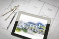 Computer Tablet Showing House Illustration On House Plans, Pencil, Compass