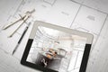 Computer Tablet Showing Kitchen Illustration On House Plans, Pencil, Compass Royalty Free Stock Photo