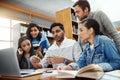 Computer, talking and students studying in a library for a group project, teamwork and education. Learning, laptop and Royalty Free Stock Photo