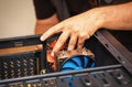 Computer technician installs system of computer.