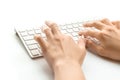 Computer training. Female online work female. Hand typing on desktop office computer keyboard. Woman using laptop Royalty Free Stock Photo