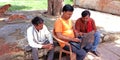 Computer tutor giving training to village people