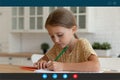 Computer video call screen view focused little girl drawing. Royalty Free Stock Photo