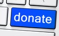 Computer white keyboard with donate
