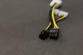 Computer wire black and yellow on gray background close up Royalty Free Stock Photo