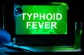 Computer with words Typhoid Fever. Royalty Free Stock Photo
