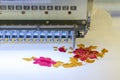 Computerized embroidery machines. sewing machine on blurred background. textile workshop. closeup