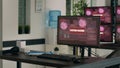 Computers displaying hacking attack alert and security breach Royalty Free Stock Photo