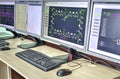 Computers and monitors with schematic diagram for supervisory, control and data acquisition