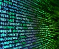 Computing, cyberspace , future and innovation concept. Developer working on program codes. Matrix byte of binary data rian code Royalty Free Stock Photo