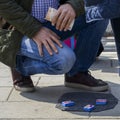 Con artists performing Shell Game scam to suspecting victims using matchsticks and small paper ball. The aim of the game Royalty Free Stock Photo