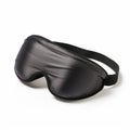 concave silk black sleep mask on white background